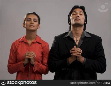 Man and woman praying