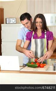 Man and woman preparing a meal together