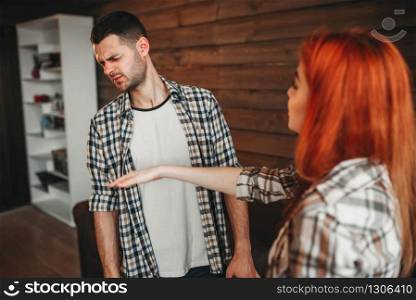 Man and woman quarrel, agressive couple. Husband and wife in conflict. Problem relationship