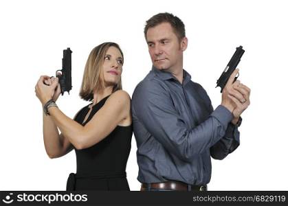 Man and woman secret agent spies with guns