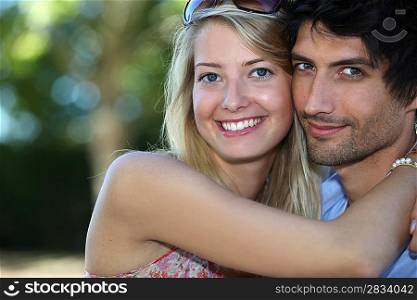 man and woman smiling