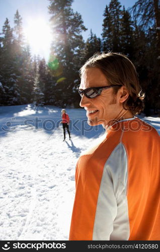 Man and Woman Snow Skiing