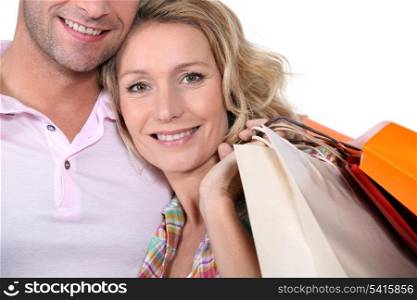 Man and woman with bags