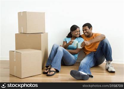 Man and woman with boxes