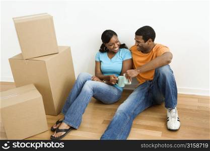 Man and woman with boxes