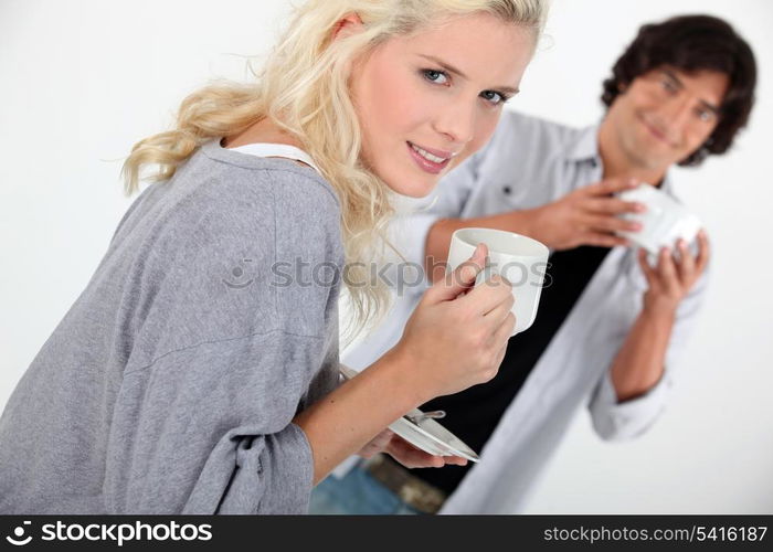 Man and woman with coffee cup