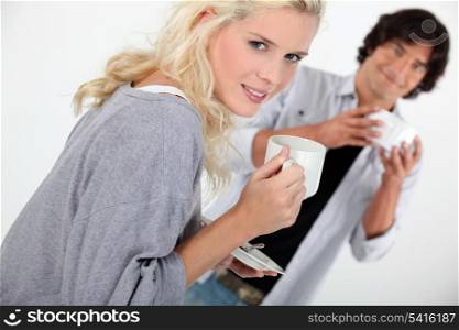 Man and woman with coffee cup