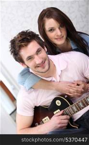 Man and woman with guitar