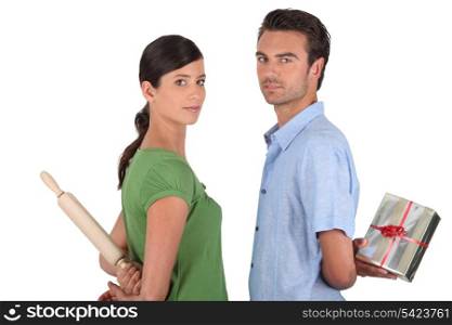 Man and woman with rolling pin