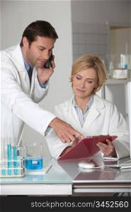 Man and woman working in a laboratory