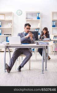 Man and woman working in the office