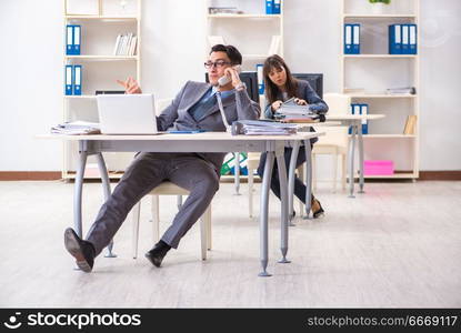 Man and woman working in the office