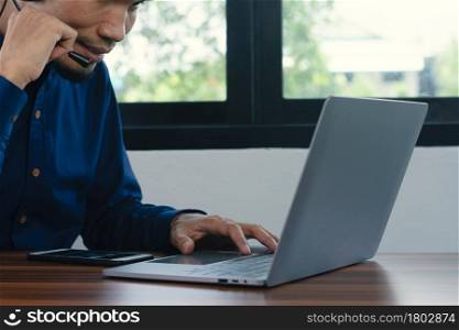 Man are call center headphone online support at home , Men working by computer online technology