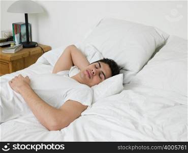 Man asleep on bed