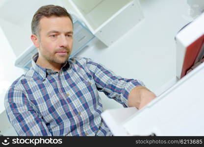 Man assembling furniture