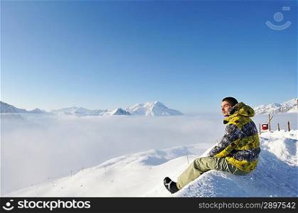 Man at mountains in clouds, Val-d&acute;Isere, Alps, France