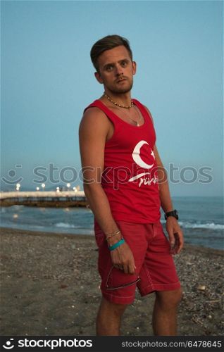 man at the evening sea. Young man at the evening sea, on the beach at Alania, Turkey