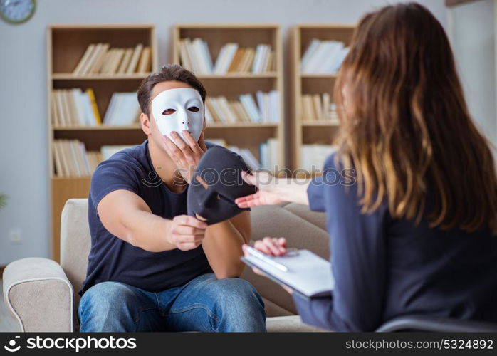 Man attending psychology therapy session with doctor