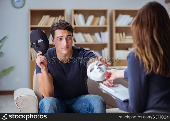 Man attending psychology therapy session with doctor