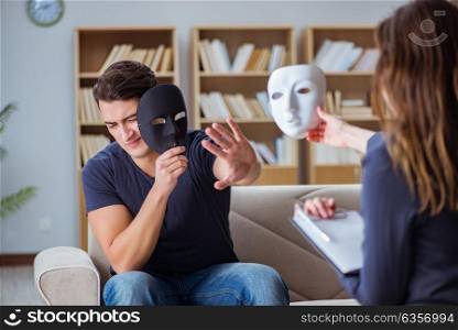Man attending psychology therapy session with doctor