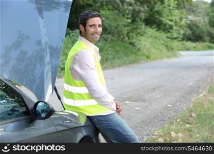 Man awaiting roadside assistance