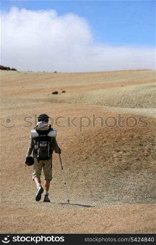 Man backpacking in the steppe