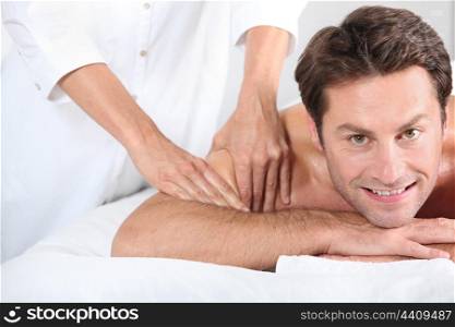 Man being given a massage.