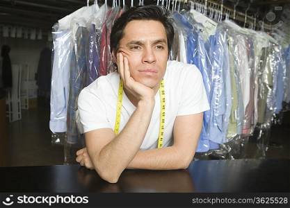 Man bored of working in the laundrette