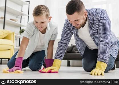 man boy cleaning floor