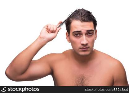 Man brushing his hair isolated on white