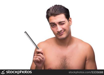 Man brushing his hair isolated on white