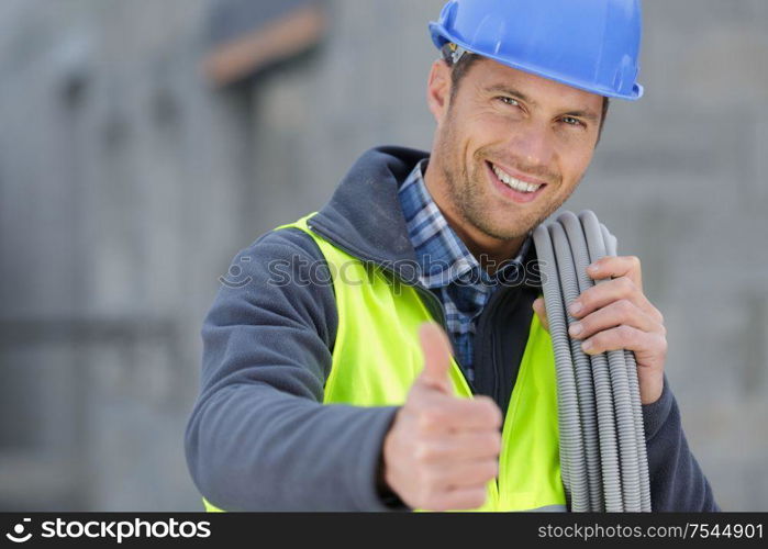 man builder before electrical repairs