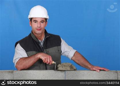 Man building wall