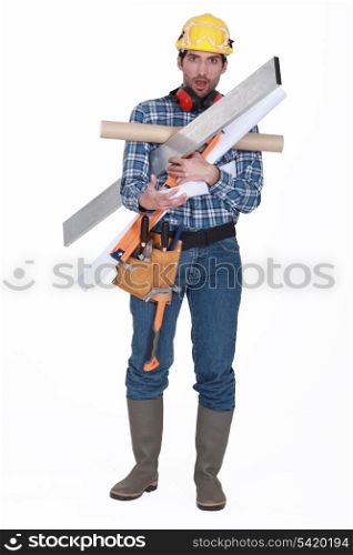 Man burdened by his tools