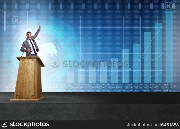 Man businessman making speech at rostrum in business concept