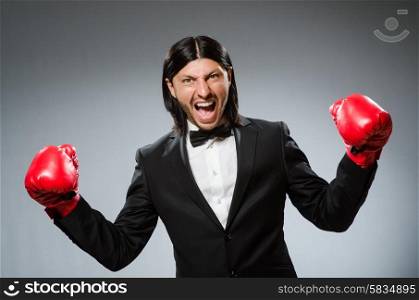 Man businessman with boxing gloves