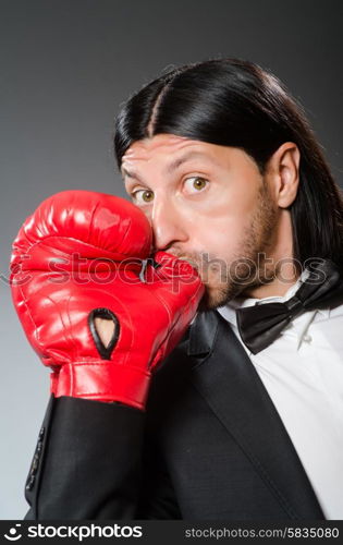 Man businessman with boxing gloves