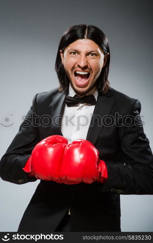 Man businessman with boxing gloves