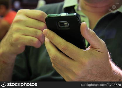 Man busy with his smartphone