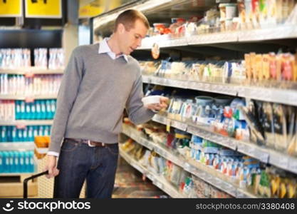 Man buying goods in the supermarket