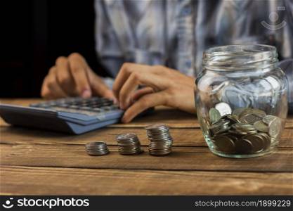 man calculating monthly savings. Resolution and high quality beautiful photo. man calculating monthly savings. High quality beautiful photo concept