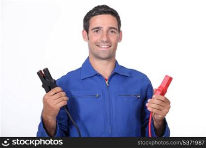 man car mechanic with alligator clips