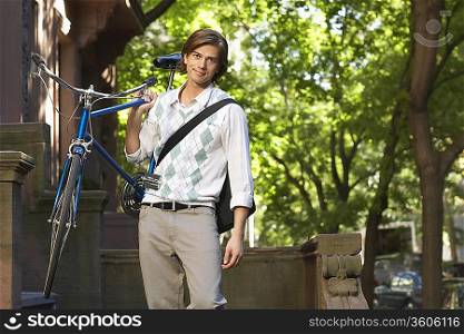 Man carrying bicycle, portrait