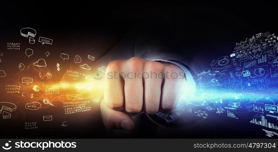 Man catch stream of light. Close up of businessman grasping light in fist