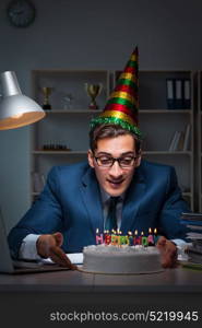 Man celebrating birthday in the office