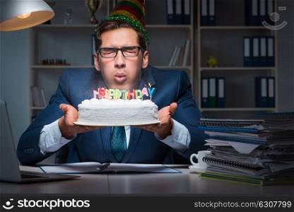 Man celebrating birthday in the office