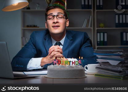 Man celebrating birthday in the office