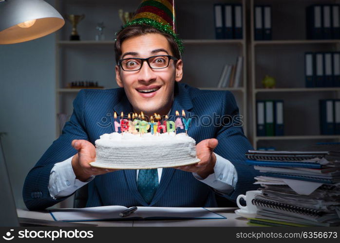 Man celebrating birthday in the office