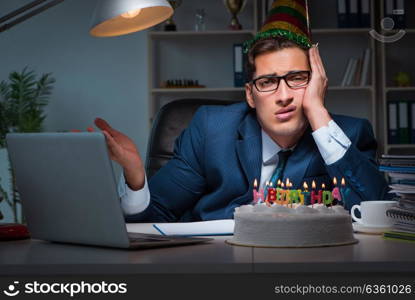 Man celebrating birthday in the office