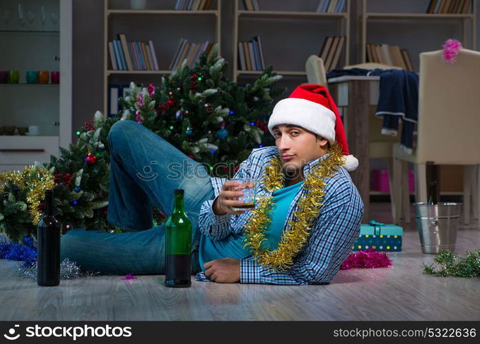 Man celebrating christmas at home alone